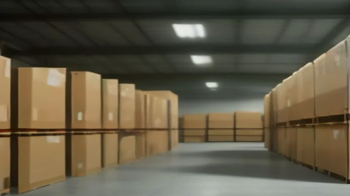 medium shot of a modern warehouse aisle with neatly stacked cartons and a clipboard on a pallet, overcast diffused light, used as the opening image